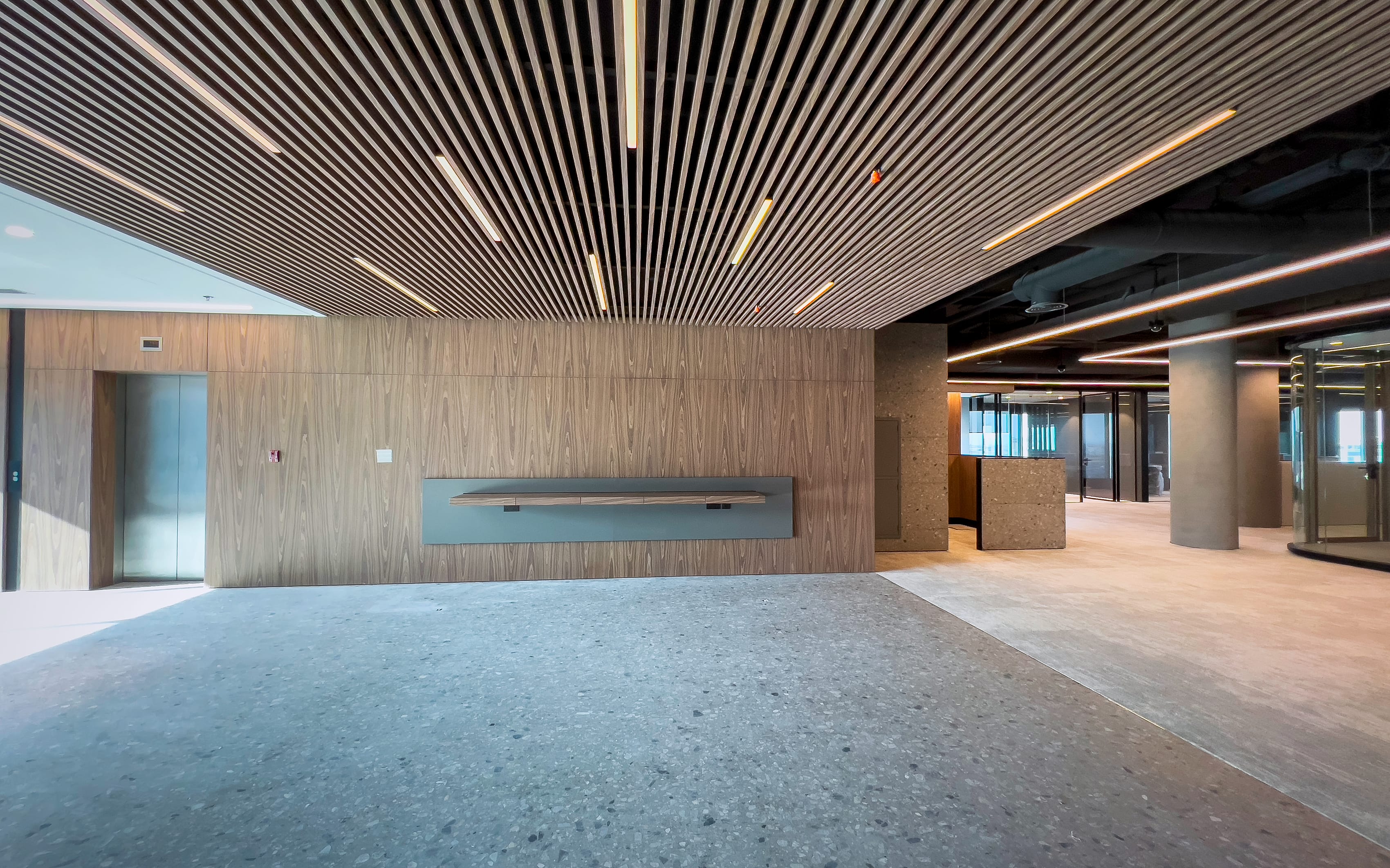 A finished lobby, empty and complete at handover